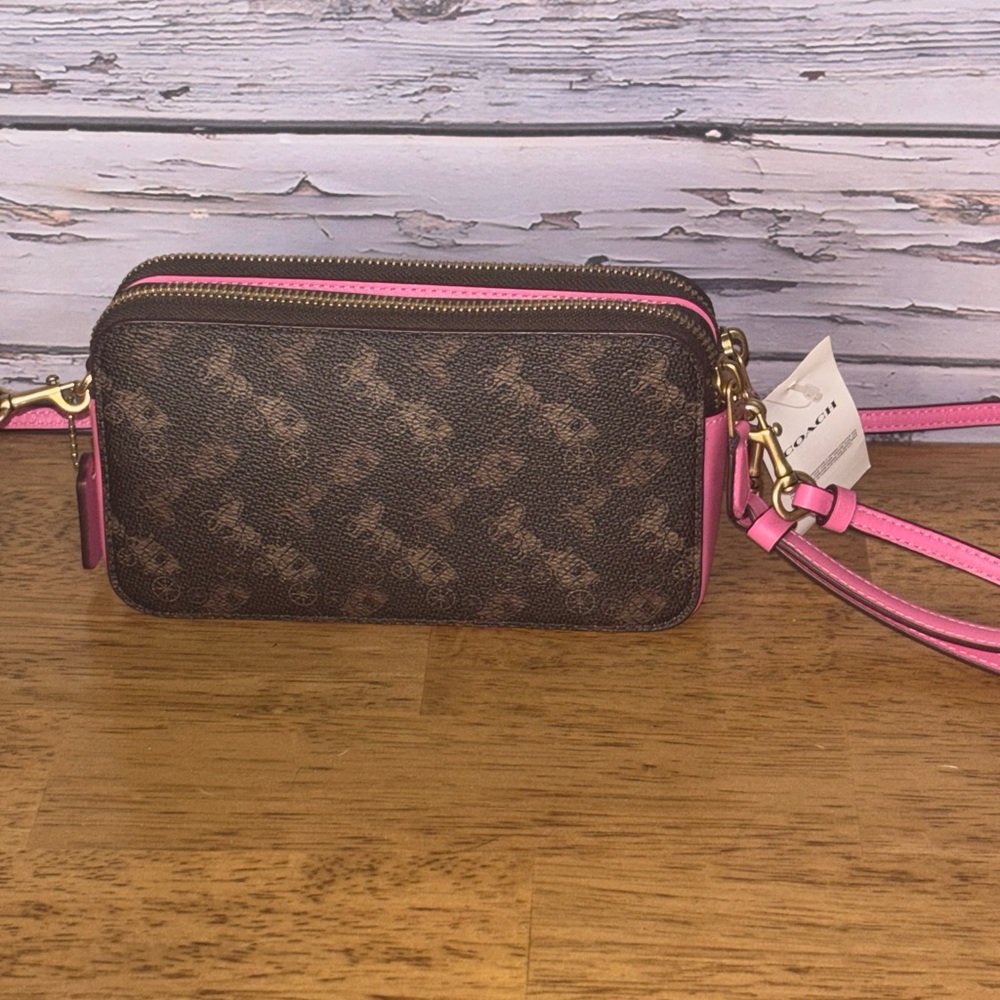 Coach Kira crossbody horse and carriage signature design.